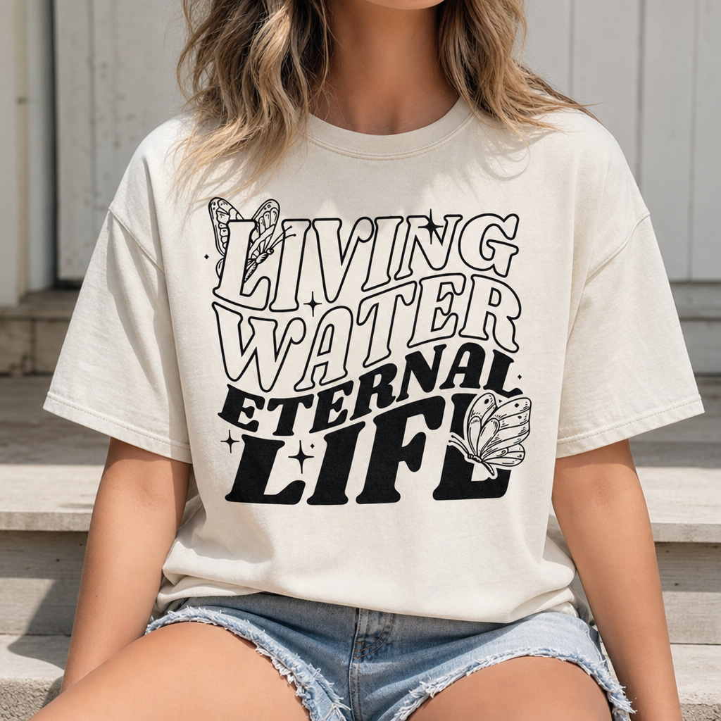 Living Water Eternal Life Tee seated front lifestyle photo